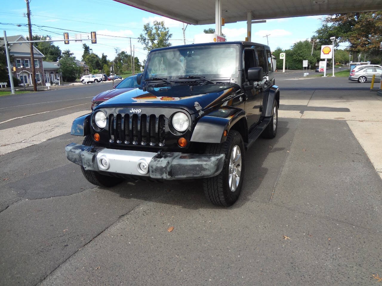 Used 2012 Jeep Wrangler Unlimited Sahara w/ Dual Top Group AWD/4WD image 2