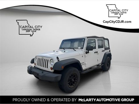 Used 2010 Jeep Wrangler Unlimited Sport image 1
