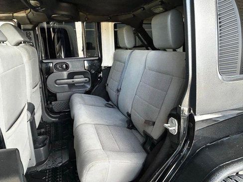 Used 2009 Jeep Wrangler Unlimited Rubicon w/ Dual Top Group AWD/4WD image 17