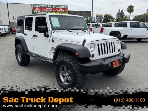 Used 2013 Jeep Wrangler Unlimited Sport AWD/4WD image 1
