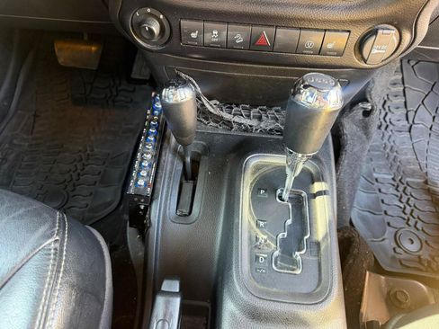 Used 2014 Jeep Wrangler Unlimited Rubicon w/ Dual Top Group AWD/4WD image 23
