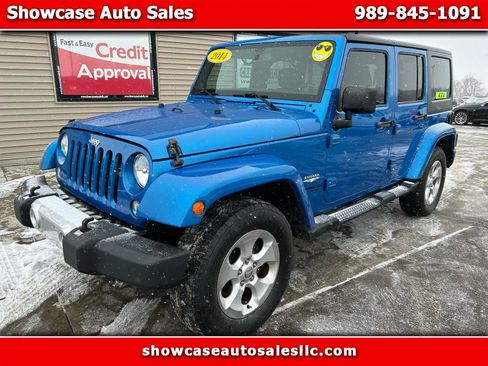 Used 2014 Jeep Wrangler Unlimited Sahara w/ Dual Top Group image 1