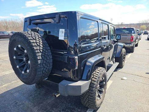 Used 2014 Jeep Wrangler Unlimited Sahara w/ Dual Top Group AWD/4WD image 3