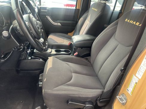 Used 2013 Jeep Wrangler Unlimited Sahara w/ Dual Top Group AWD/4WD image 11