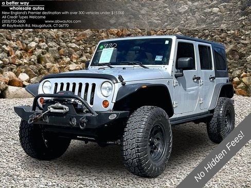 Used 2012 Jeep Wrangler Unlimited Rubicon w/ Dual Top Group AWD/4WD image 1