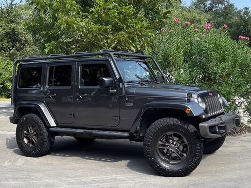 Used 2016 Jeep Wrangler Unlimited Sahara AWD/4WD image 1