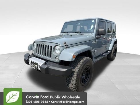 Used 2014 Jeep Wrangler Unlimited Sahara w/ Dual Top Group AWD/4WD image 1