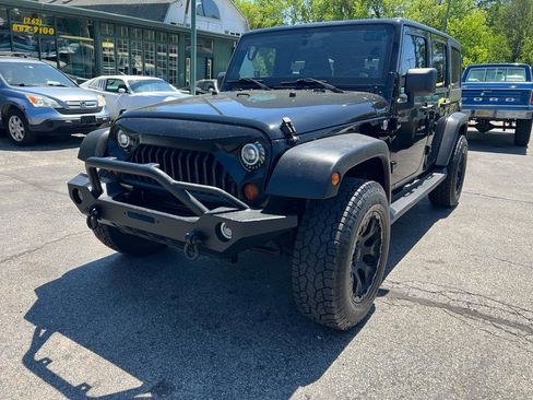 Used 2011 Jeep Wrangler Unlimited Sport AWD/4WD image 2