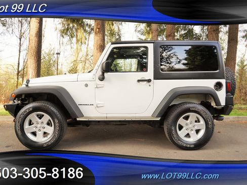 Used 2015 Jeep Wrangler Sport image 1