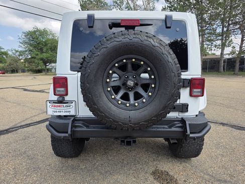 Used 2013 Jeep Wrangler Unlimited Sahara w/ Dual Top Group AWD/4WD image 5