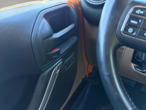 Used 2013 Jeep Wrangler Unlimited Sahara w/ Dual Top Group AWD/4WD image 21