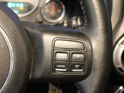 Used 2013 Jeep Wrangler Unlimited Sahara w/ Dual Top Group AWD/4WD image 16
