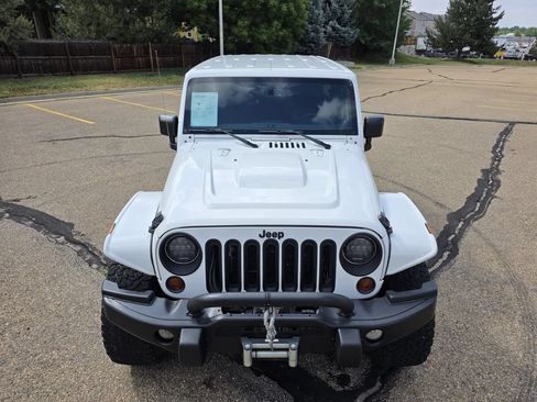 Used 2013 Jeep Wrangler Unlimited Sahara w/ Dual Top Group AWD/4WD image 12