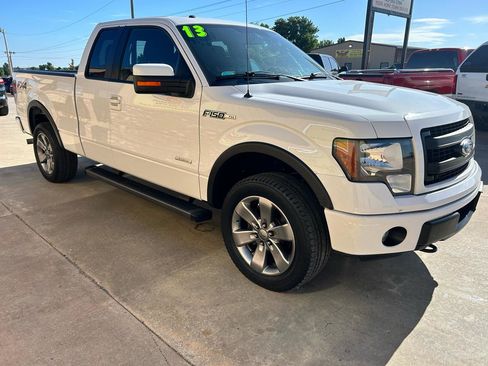 Used 2013 Ford F150 FX4 w/ Mid Equipment Group AWD/4WD image 1
