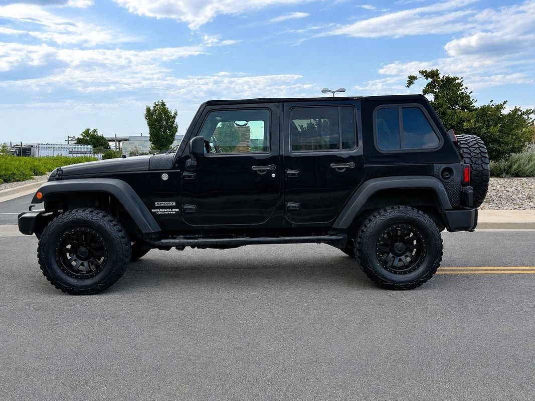 Used 2011 Jeep Wrangler Unlimited Sport AWD/4WD image 2
