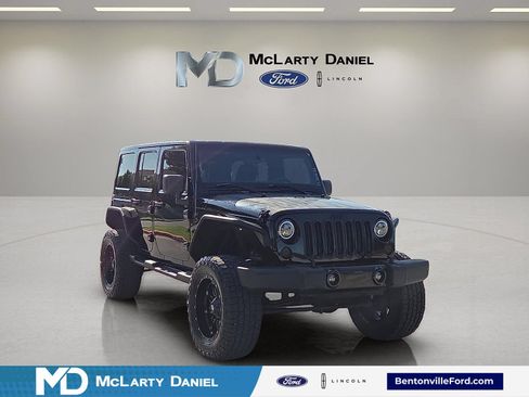 Used 2012 Jeep Wrangler Unlimited Sahara AWD/4WD image 1