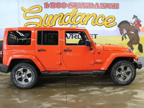 Used 2015 Jeep Wrangler Unlimited Sahara w/ Dual Top Group AWD/4WD image 1