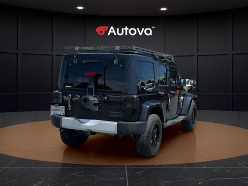 Used 2014 Jeep Wrangler Unlimited Sahara w/ Dual Top Group AWD/4WD image 5