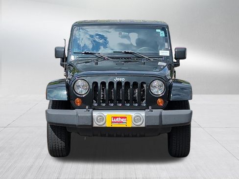 Used 2012 Jeep Wrangler Unlimited Sahara w/ Dual Top Group AWD/4WD image 2