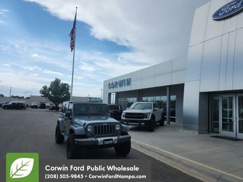 Used 2014 Jeep Wrangler Unlimited Sahara w/ Dual Top Group AWD/4WD image 1