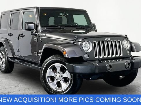 Used 2017 Jeep Wrangler Unlimited Sahara w/ Dual Top Group AWD/4WD image 1