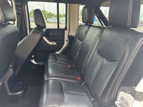 Used 2015 Jeep Wrangler Unlimited Sahara w/ Dual Top Group AWD/4WD image 23