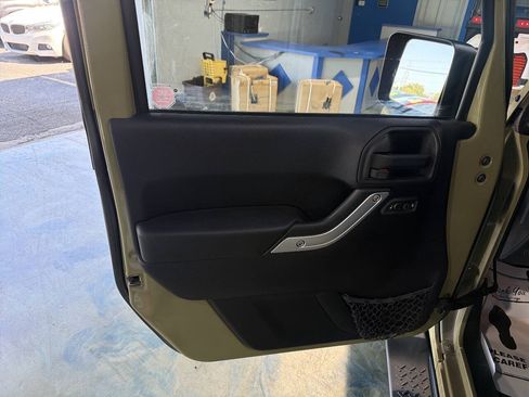 Used 2013 Jeep Wrangler Unlimited Sahara w/ Dual Top Group AWD/4WD image 15