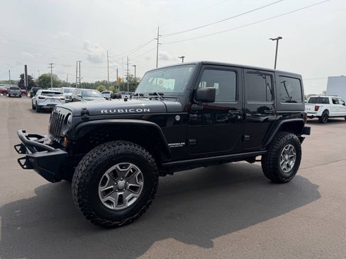 Used 2013 Jeep Wrangler Unlimited Rubicon w/ Dual Top Group AWD/4WD image 4