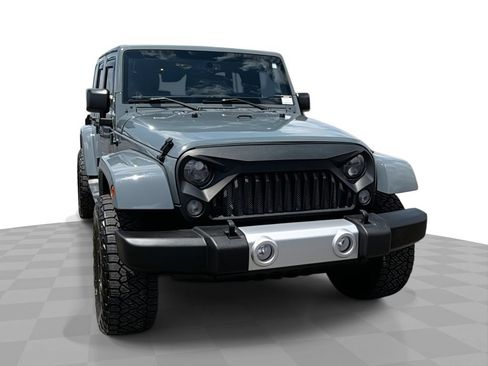 Used 2015 Jeep Wrangler Unlimited Sahara AWD/4WD image 1