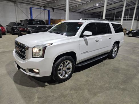 Used 2019 GMC Yukon XL SLT w/ Open Road Package AWD/4WD image 1