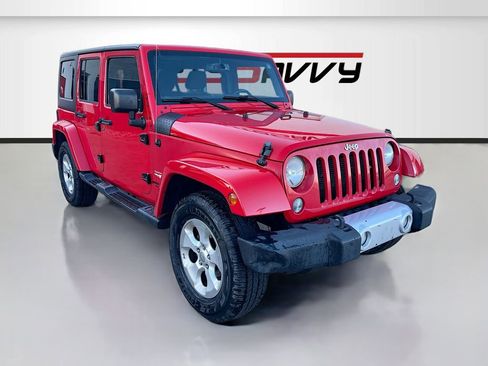 Used 2015 Jeep Wrangler Unlimited Sahara w/ Dual Top Group AWD/4WD image 1