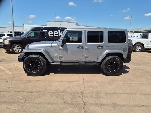 Used 2015 Jeep Wrangler Unlimited Sahara w/ Max Tow Package AWD/4WD image 9