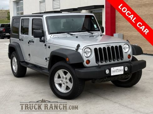 Used 2010 Jeep Wrangler Unlimited Sport AWD/4WD image 1