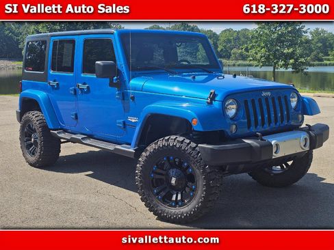 Used 2015 Jeep Wrangler Unlimited Sahara AWD/4WD image 1