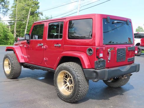 Used 2013 Jeep Wrangler Unlimited Rubicon w/ Dual Top Group AWD/4WD image 4