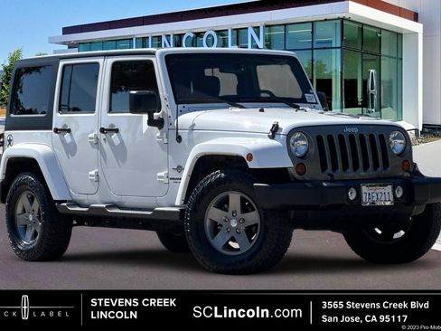 Used 2013 Jeep Wrangler Unlimited Sport AWD/4WD image 1