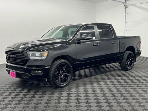 Used 2024 RAM 1500 Laramie AWD/4WD image 1
