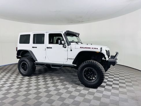 Used 2015 Jeep Wrangler Unlimited Rubicon w/ Dual Top Group AWD/4WD image 2
