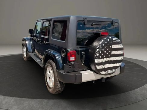 Used 2014 Jeep Wrangler Unlimited Sahara w/ Dual Top Group AWD/4WD image 6