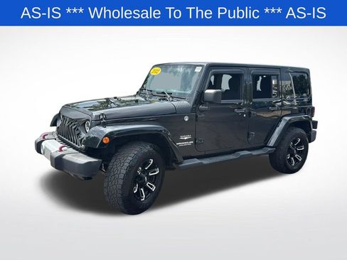 Used 2012 Jeep Wrangler Unlimited Sahara w/ Dual Top Group AWD/4WD image 3