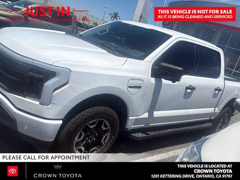 Used 2023 Ford F150 Lightning XLT AWD/4WD image 1