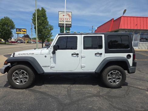 Used 2015 Jeep Wrangler Unlimited Rubicon w/ Connectivity Group AWD/4WD image 1
