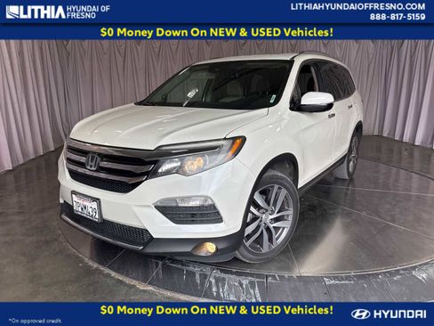 Used 2016 Honda Pilot Touring image 1
