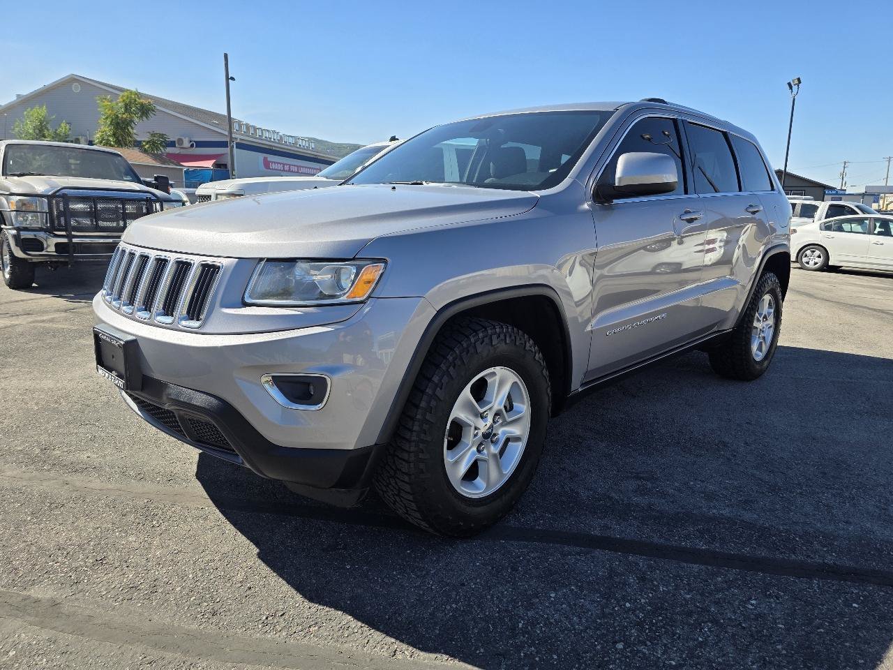 Used 2014 Jeep Grand Cherokee Laredo AWD/4WD image 1