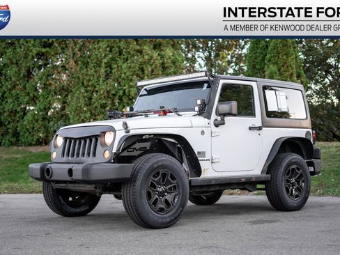 Used 2015 Jeep Wrangler Sport image 1