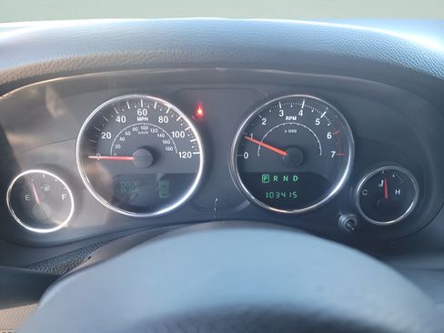 Used 2012 Jeep Wrangler Unlimited Sahara w/ Dual Top Group AWD/4WD image 12