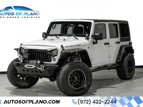 Used 2015 Jeep Wrangler Unlimited Rubicon w/ Connectivity Group AWD/4WD image 1