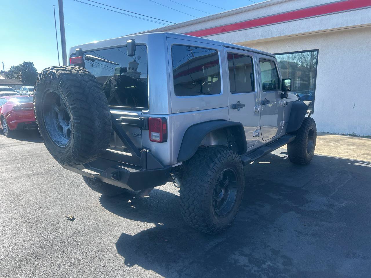 Used 2013 Jeep Wrangler Unlimited Sahara w/ Dual Top Group AWD/4WD image 5