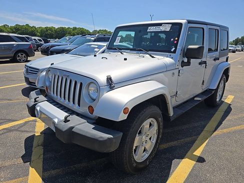 Used 2008 Jeep Wrangler Unlimited Sahara w/ Dual Top Group AWD/4WD image 1