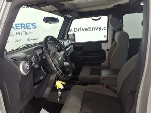 Used 2010 Jeep Wrangler Unlimited Sahara w/ Dual Top Group AWD/4WD image 12